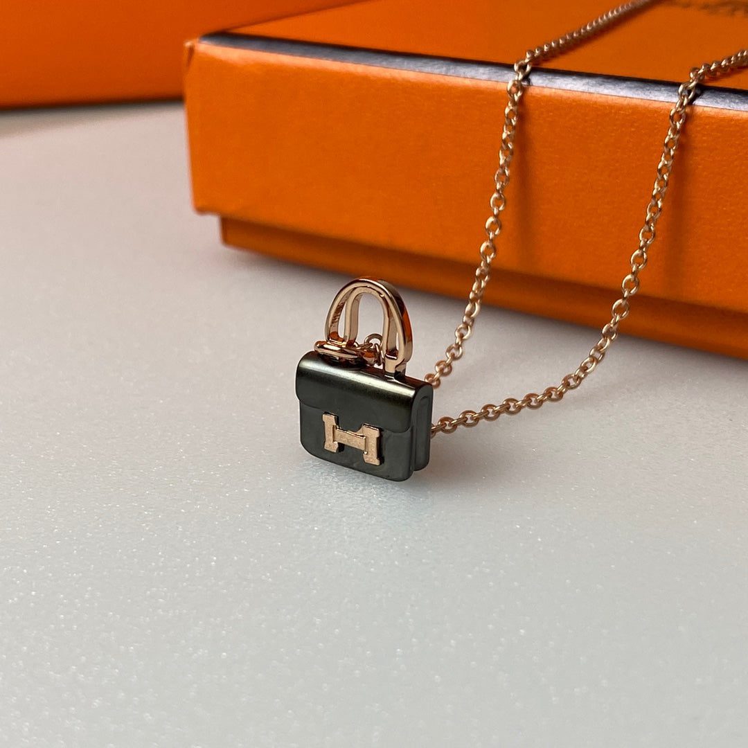 Hermès CONSTANCE BLACK PEDANT PINK GOLD NECKLACE - Image 2