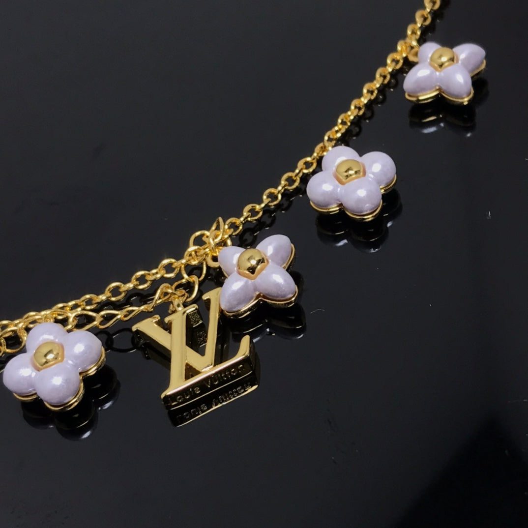 Louis Vuitton LOGO 6 MOTIF STAR AND SUN GOLD BRACELET - Image 2