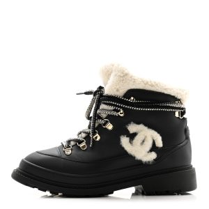 CHANEL CC CALFSKIN LEATHER SHEARLING LACE-UP BOOTS