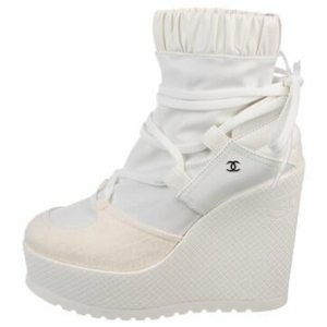 CHANEL INTERLOCKING CC LOGO LACE UP BOOTS