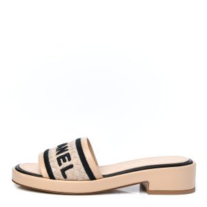 CHANEL LAMBSKIN EMBROIDERED LOGO MULES