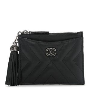 CHANEL LEATHER CHEVRON MINI TASSEL ZIP POUCH