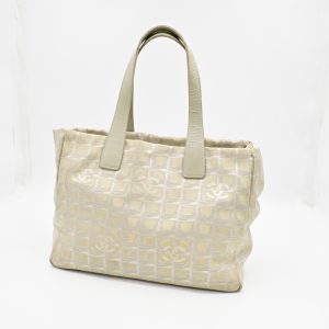 Chanel New Travel Line Tote in Champagne Canvas