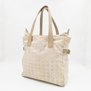 Chanel New Travel Line Zip Tote in Beige Canvas