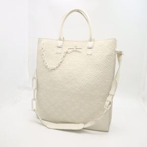 Louis Vuitton Sac Plat in Off White Empreinte Leather