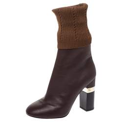 CHANEL BROWN MAILER 16K CHUNKY HEEL LOGO BOOTS